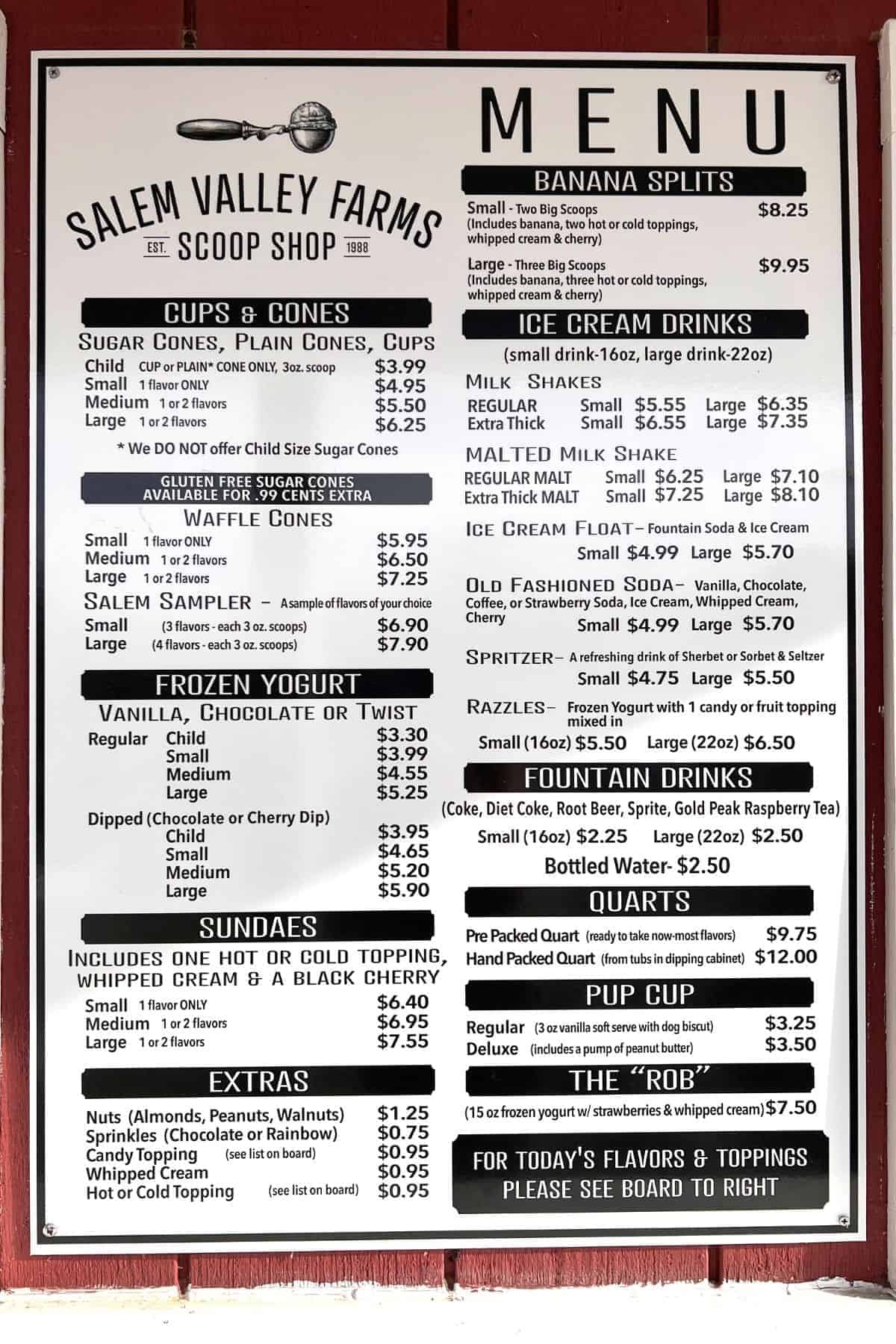 Salem Valley Farms ice cream shop menu board listing prices and options for cones, cups, sundaes, banana splits, shakes, floats, and toppings. Enjoy a taste of classic Salem Valley ice cream with every treat you choose.