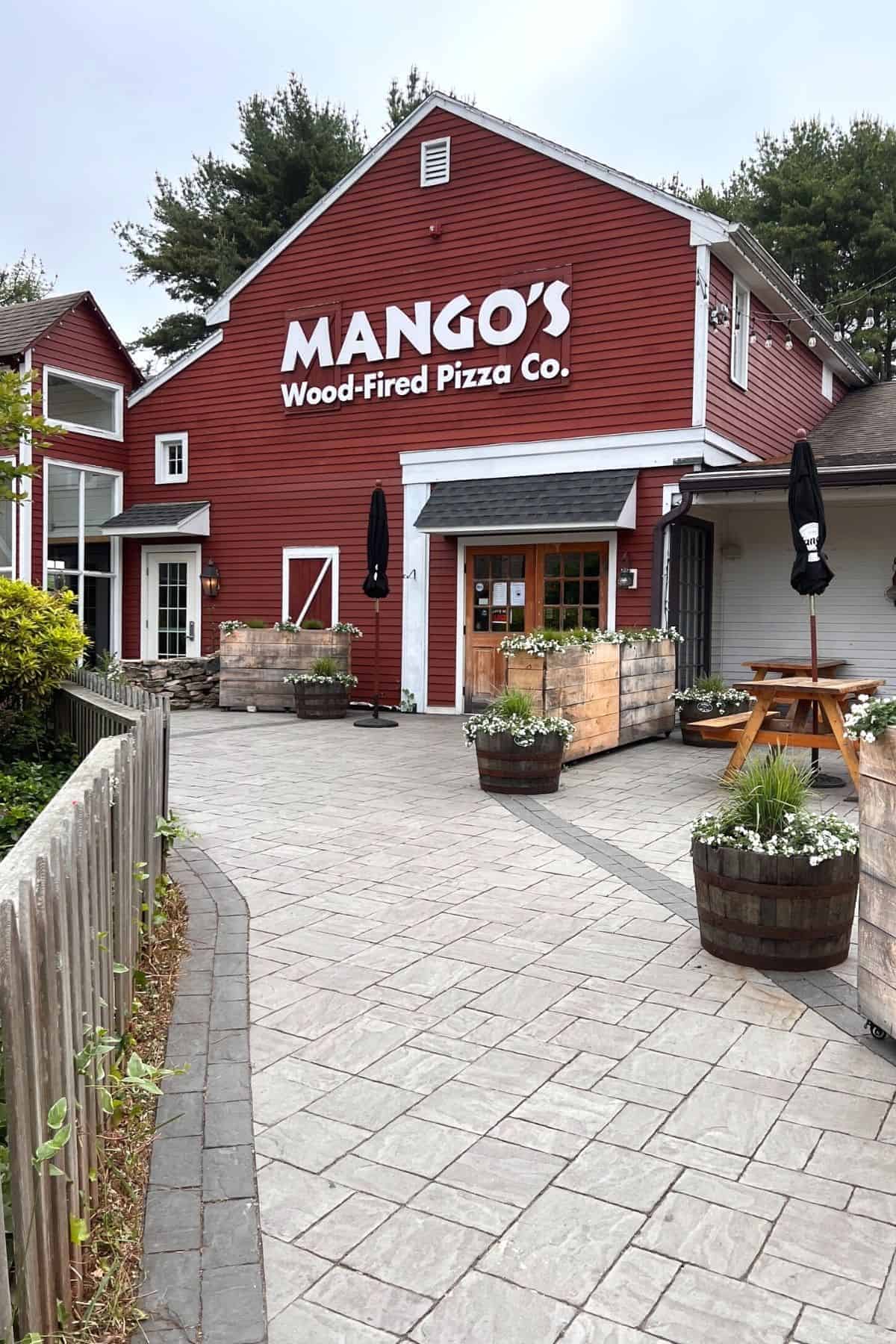 mangos storefront, one of the old mystic village restaurants specializing in pizza.