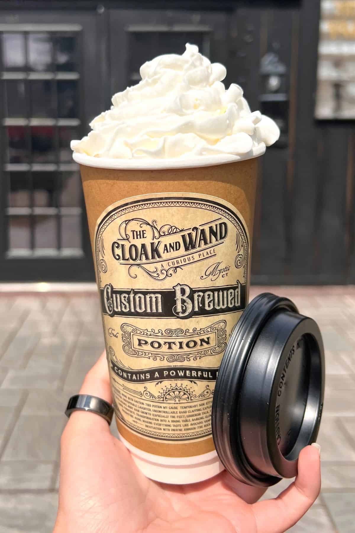 hot drink from the cloak and wand topped with whipped cream.