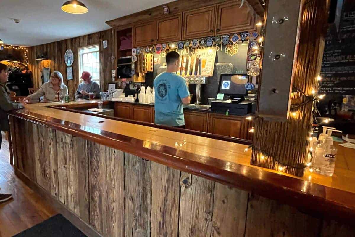 bar and taps at shunock river brewery.