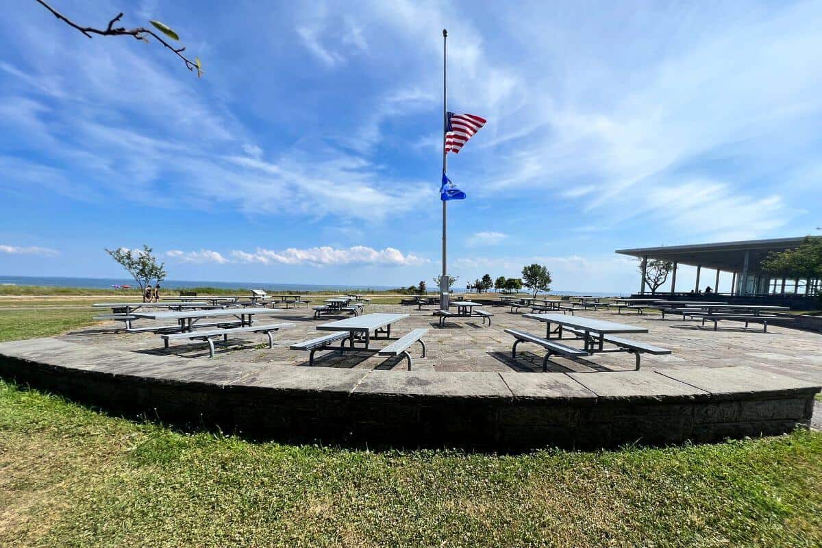 picnic tables and flag pole.