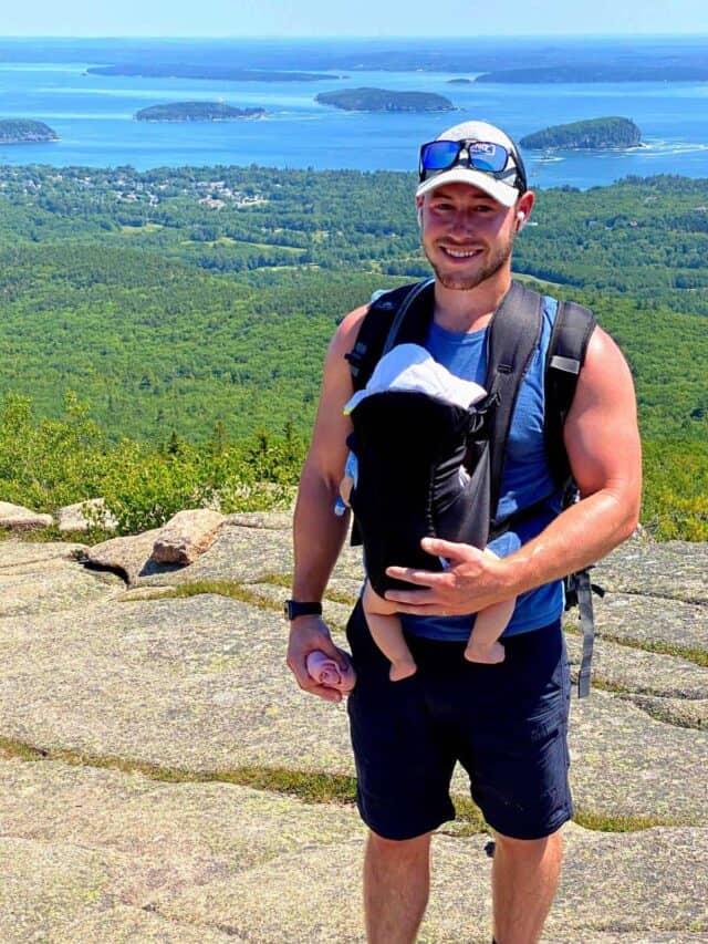 standing on top of mountain.