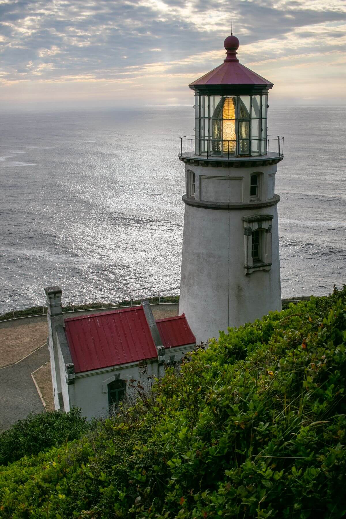 lighthouse with ocean in background.