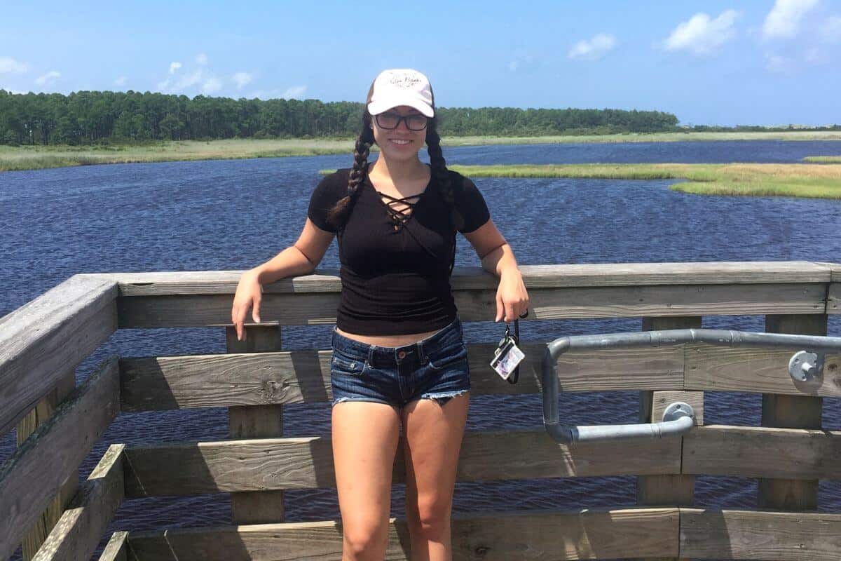 posing at the viewing deck by the bodie island marshlands.