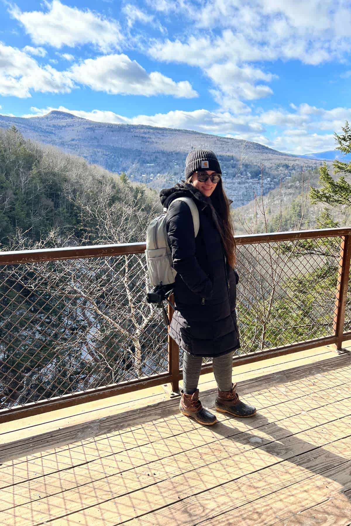 Posing on the viewing platform with Catskill Mountains in the background.