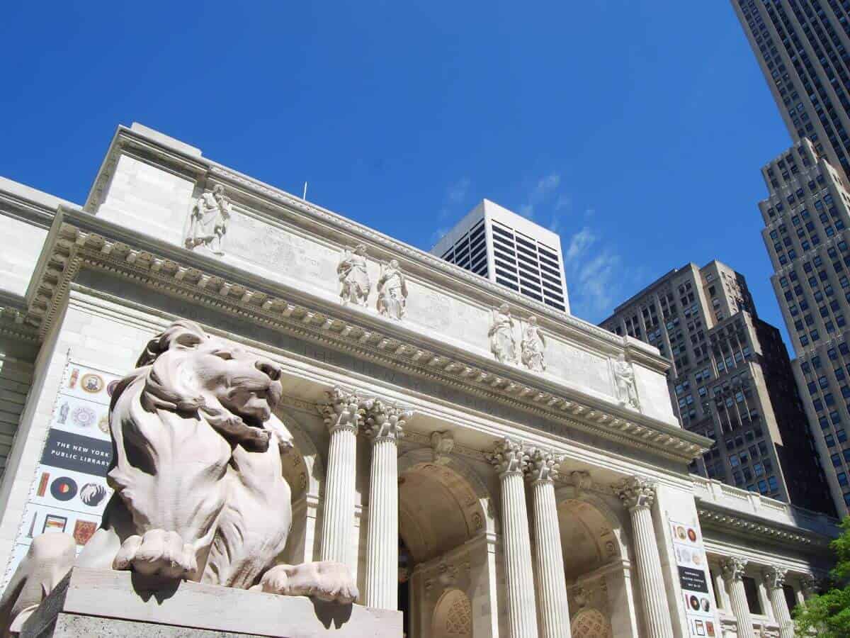 View of lion statue in front of New York Public Library.
