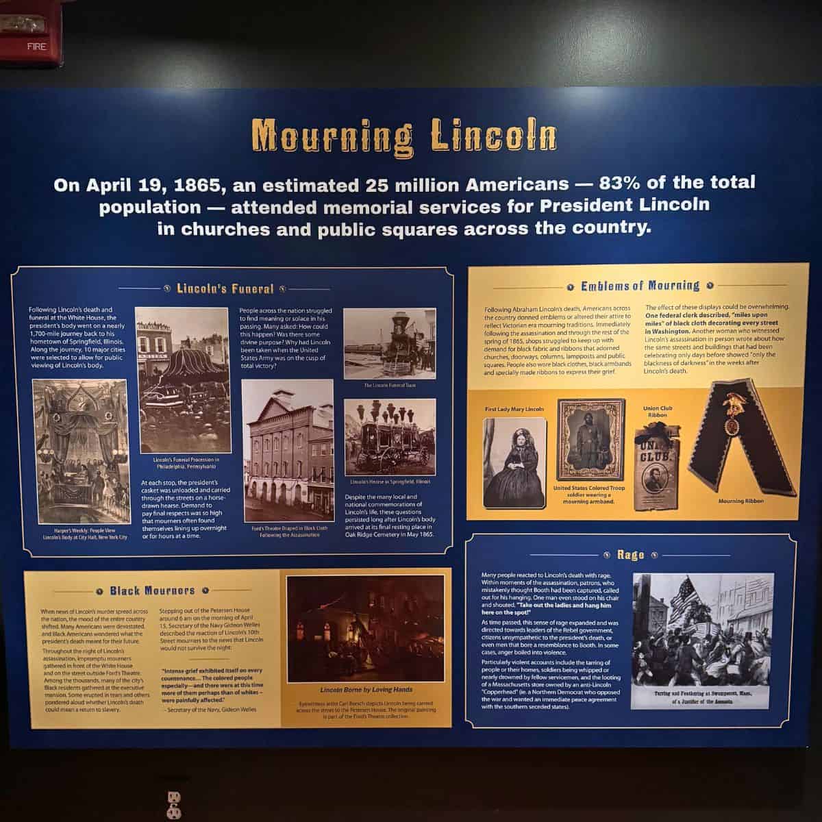 Exhibit panel titled "Mourning Lincoln" detailing Lincoln's funeral, emblems of mourning, Black mourners, and the role of rage with historical images and text.